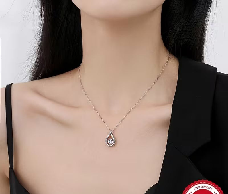 The Dewdrop Necklace — Moissanite Teardrop in Sterling Silver