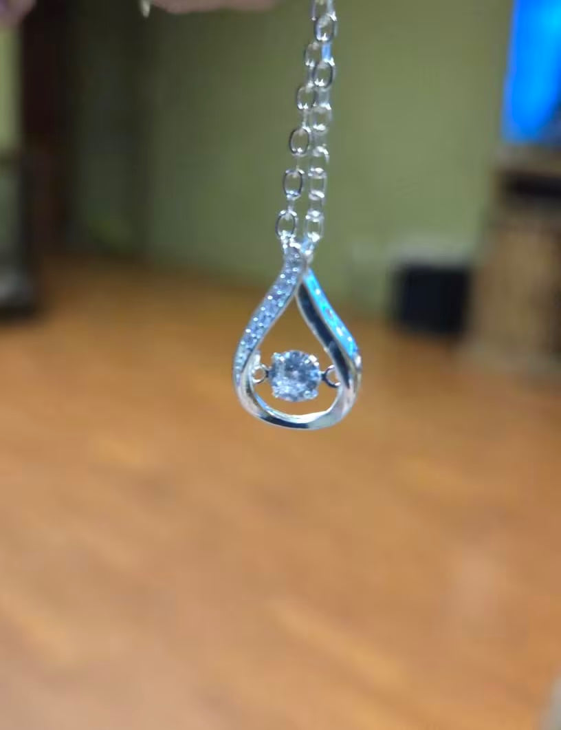 The Dewdrop Necklace — Moissanite Teardrop in Sterling Silver