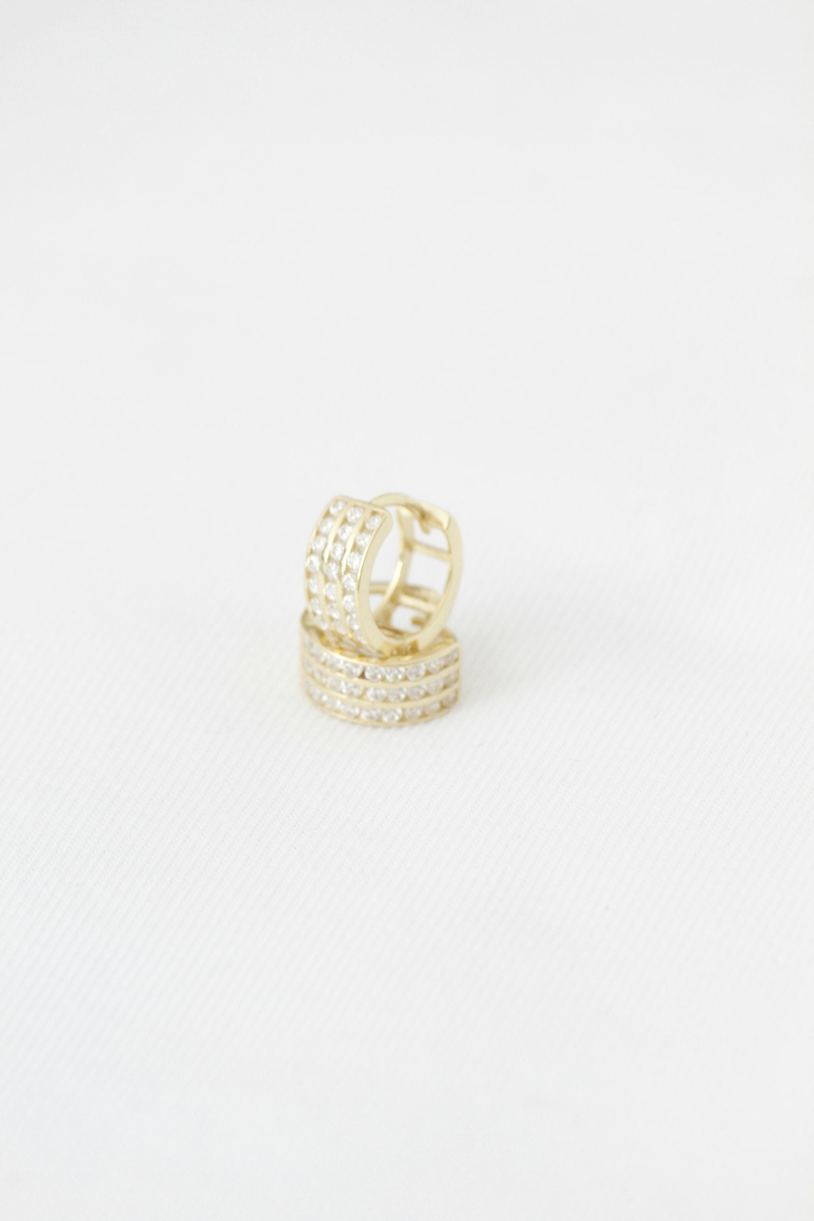 The Waterproof Hoops — 18K Gold Huggie Earrings